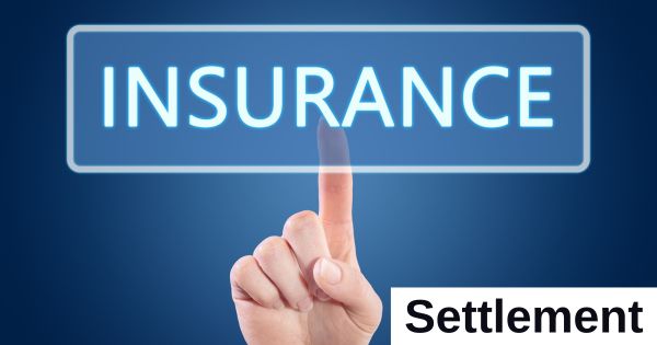 A finger touches a box with the word insurance in it.