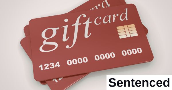 Three generic gift cards are stacked on top of each other.